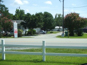 view of entrance and sign from across street on Gordon Road